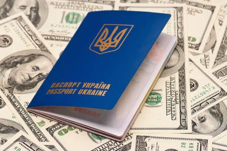International Ukrainian passport on US dollars backgroundの写真素材