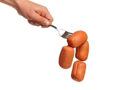 Sausage on fork isolated on white backgroundの写真素材