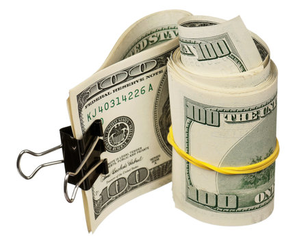 Roll of dollars with rubber band isolated on white backgroundの写真素材