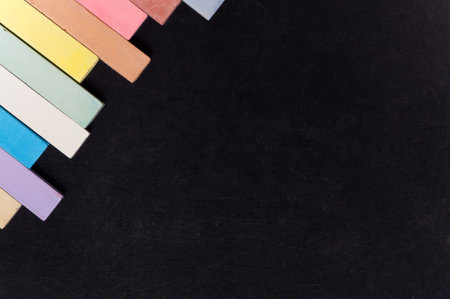 Empty blank black chalkboard with colorful chalk