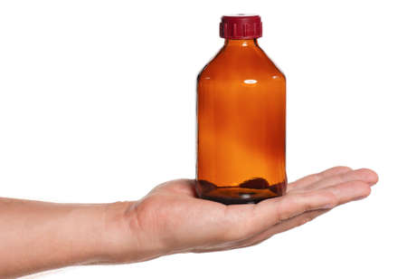Man hand with small bottle isolated on white backgroundの写真素材