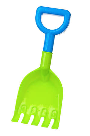 Toy small rake isolated on white backgroundの写真素材