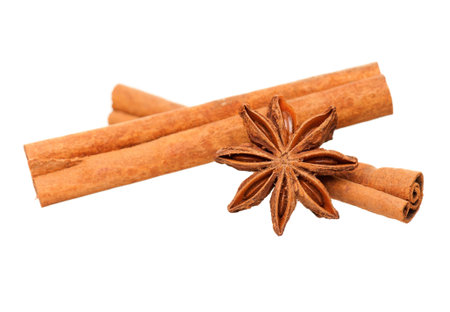 Cinnamon sticks and star anise isolated on white background