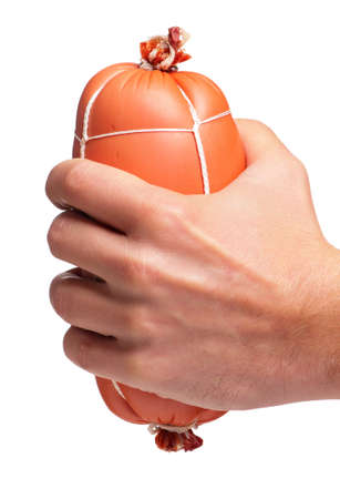 Man hand with sausage isolated on white backgroundの写真素材