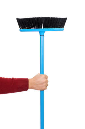 Man hand with plastic broom, isolated on white backgroundの写真素材