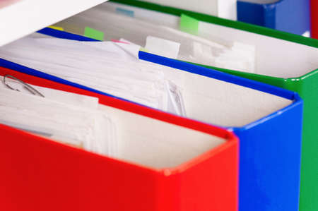 Close-up of file folders on the shelves at officeの写真素材