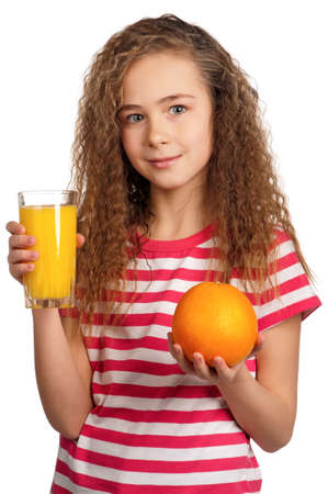 Portrait of happy girl with orange juice isolated on white backgroundの写真素材