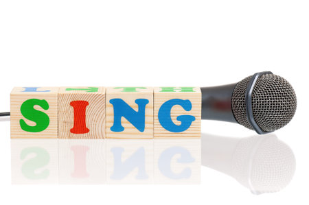 Microphone and word Sing isolated on white background
