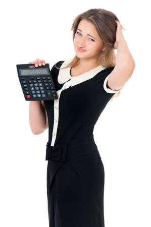 Beautiful business woman with calculator, isolated on white backgroundの写真素材