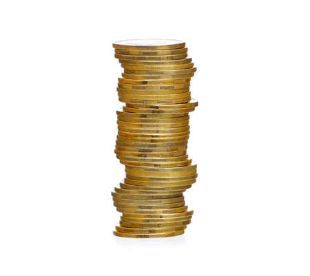 Towers made out of coins isolated on white backgroundの写真素材