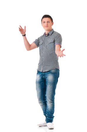 Full length portrait of a young happy man, isolated on white backgroundの写真素材