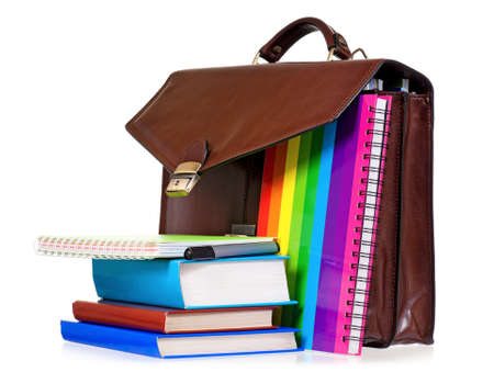 Brown leather briefcase with office accessories, isolated on white backgroundの写真素材