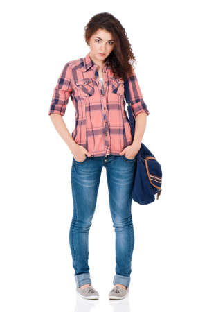 Full length portrait of student girl with bag, isolated on white backgroundの写真素材