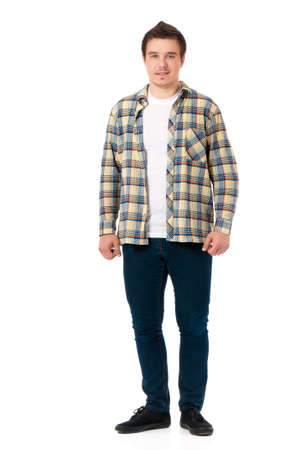 Full length portrait of a young modern man, isolated on white backgroundの写真素材