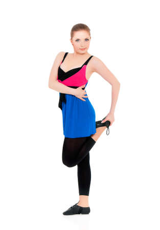Young happy woman doing fitness exercise, isolated on white backgroundの写真素材