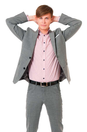 Successful young businessman in suit, isolated on white backgroundの写真素材