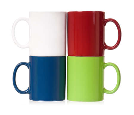 Colorful cups for coffee or tea, isolated on white backgroundの写真素材