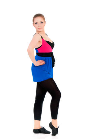 Young happy woman doing fitness exercise, isolated on white backgroundの写真素材