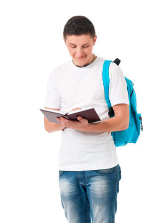 Boy student with backpack and notepad, isolated on white backgroundの写真素材