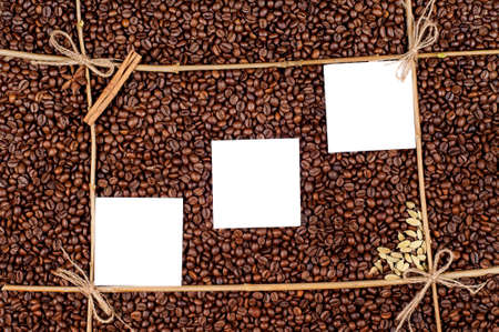 Empty paper on roasted coffee beans, can be used as backgroundの写真素材