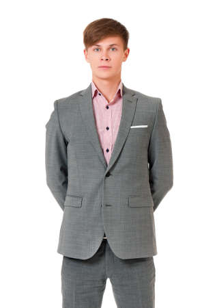 Successful young businessman in suit, isolated on white backgroundの写真素材