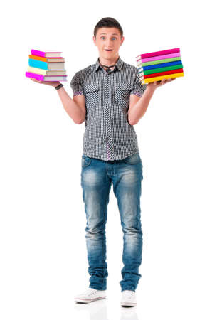 Young student carrying books, isolated on white backgroundの写真素材