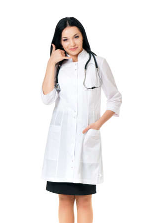 Smiling medical doctor woman with stethoscope, isolated on white backgroundの写真素材