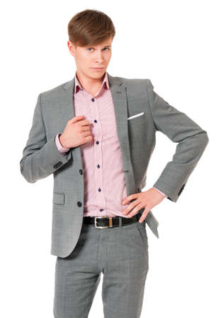 Successful young businessman in suit, isolated on white backgroundの写真素材