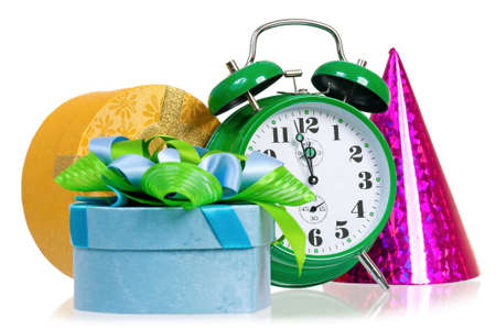Big green alarm clock with gift box, isolated on white backgroundの写真素材