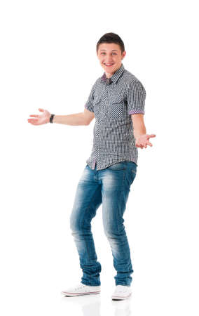 Full length portrait of a young happy man, isolated on white backgroundの写真素材