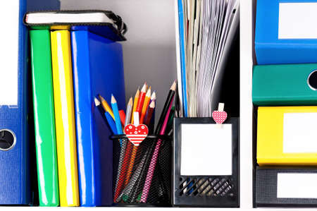 File folders, standing on the shelves at officeの写真素材