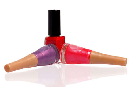 Three bottles of nail polish isolated on white backgroundの写真素材