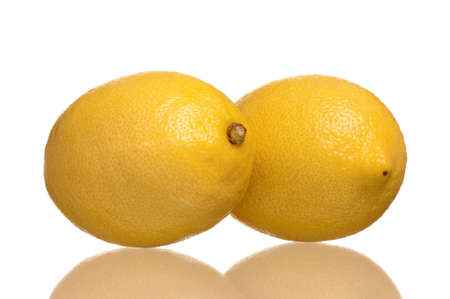 Fresh ripe lemons isolated on white backgroundの写真素材