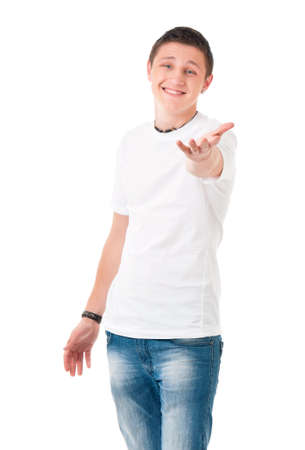 Happy teenage student boy, isolated over white backgroundの写真素材