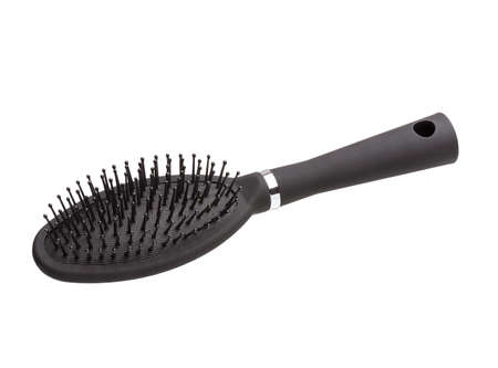 Elegant black hair comb brush with handle, isolated white background. Full depth of field with clipping path.の写真素材