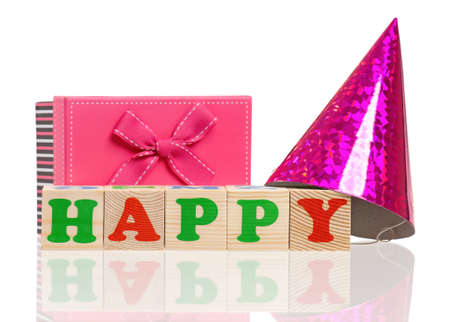 Happy word formed by colorful wooden alphabet blocks, isolated on white backgroundの写真素材