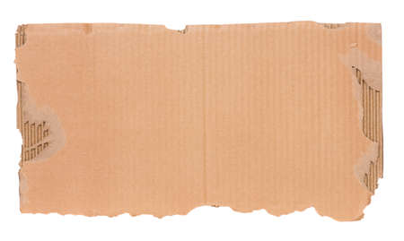 Piece of corrugated cardboard torn, isolated on white background. Cardboard texture ragged edge.の写真素材