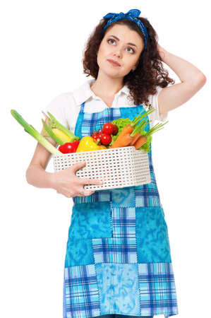 Woman with fresh vegetables, isolated on white backgroundの写真素材