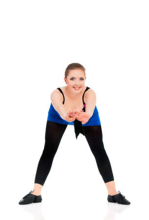 Beautiful young woman dancer, isolated on white backgroundの写真素材