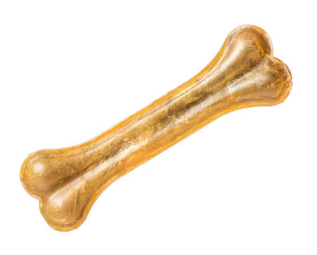 Artificial dog chew bone food with vitamins isolated on white backgroundの写真素材
