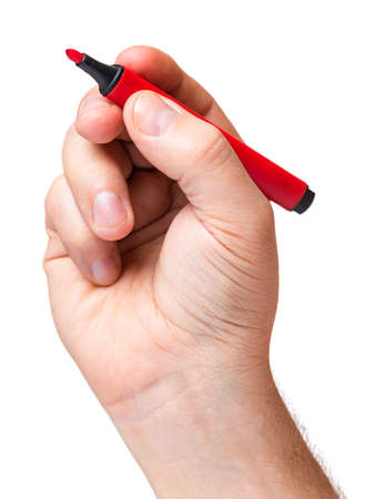 Male hand holding red marker, isolated on white background.の写真素材