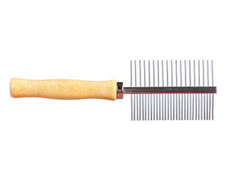Close up shot of a dogs grooming brush. Comb for the animals.の写真素材