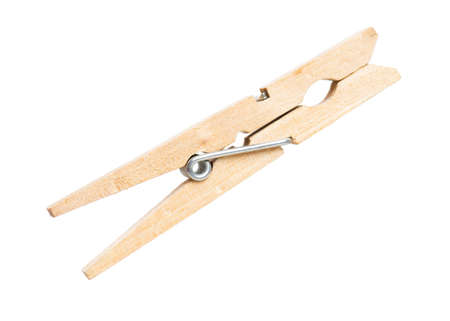 Wooden clothespin isolated on white background - close-upの写真素材