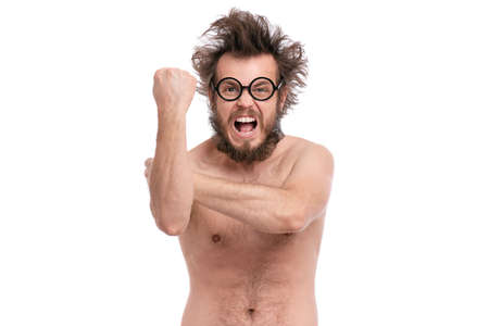 Crazy bearded Angry Man with funny Haircut in Eyeglasses Screaming and making Bad gesture. Naked guy, isolated on white background.の写真素材