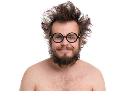 Crazy bearded Happy Man with funny Haircut in eye Glasses. Cheerful and silly naked guy looking at...