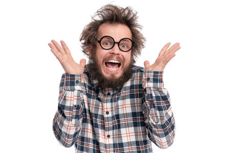 Crazy bearded Man with funny Haircut in Eyeglasses, isolated on white background. Happy Surprised guy in plaid shirt - screaming and keeping mouth open. Emotions and signs concept.の写真素材