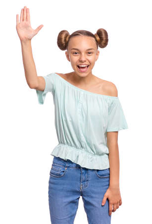 Portrait of happy teen girl making greeting gesture with palm. Teenager student Back to school. Caucasian cute smiling child, isolated on white background.の写真素材