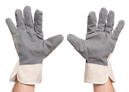 Worker showing gesture - open palm and five fingers. Male hands wearing working glove, isolated on white background.の写真素材