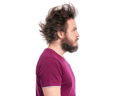 Crazy bearded Man with funny Curly Hair - side view, isolated on white background. Looking away -...