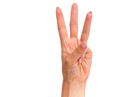 Female hand showing 3 fingers gesture, isolated on white background. Beautiful hand of woman with copy space. Hand doing gesture of number Three. Series of photos count from 1 to 5.の写真素材